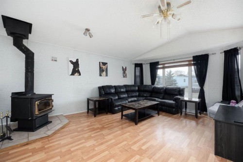212 Gregoire Crescent, Fort Mcmurray, AB - Indoor Photo Showing Living Room With Fireplace