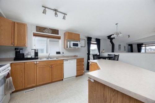 212 Gregoire Crescent, Fort Mcmurray, AB - Indoor Photo Showing Kitchen With Double Sink