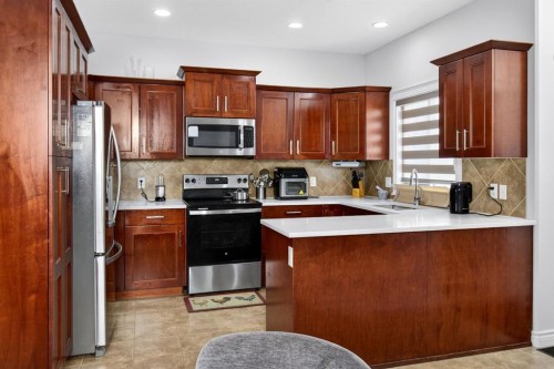 128 Juniper Street, Fort Mcmurray, AB - Indoor Photo Showing Kitchen