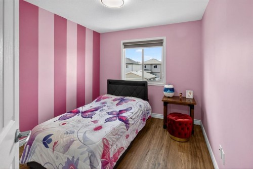 128 Juniper Street, Fort Mcmurray, AB - Indoor Photo Showing Bedroom