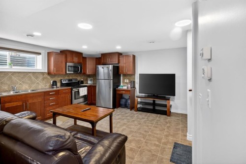 128 Juniper Street, Fort Mcmurray, AB - Indoor Photo Showing Kitchen With Double Sink