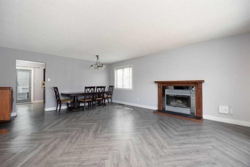 233 Bacon Place, Fort Mcmurray, AB - Indoor Photo Showing Living Room With Fireplace