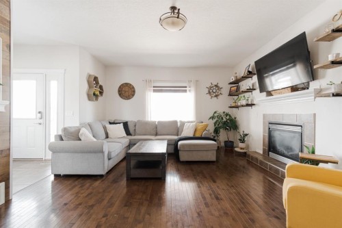 128 Coyote Crescent, Fort Mcmurray, AB - Indoor Photo Showing Living Room With Fireplace