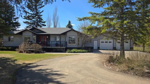673078 Rr 185, Grassland, AB - Outdoor With Deck Patio Veranda With Facade