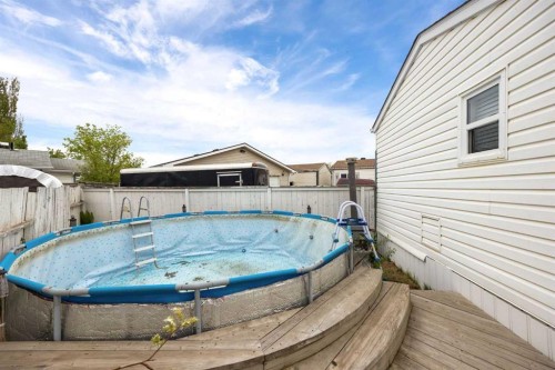 147 Cree Lane, Fort Mcmurray, AB - Outdoor With Above Ground Pool