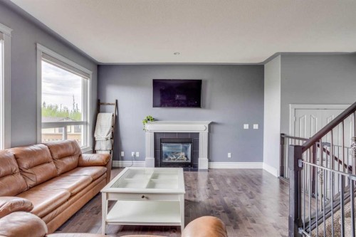 377 Walnut Crescent, Fort Mcmurray, AB - Indoor Photo Showing Living Room With Fireplace