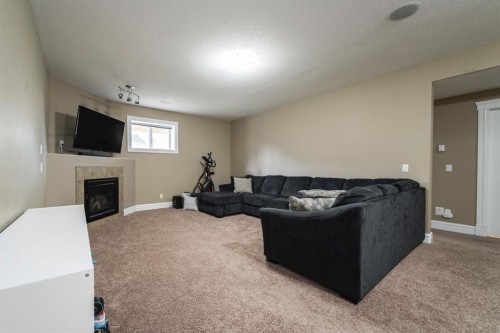 162 Pearl Bay, Fort Mcmurray, AB - Indoor Photo Showing Other Room With Fireplace