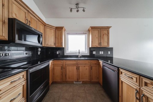 162 Pearl Bay, Fort Mcmurray, AB - Indoor Photo Showing Kitchen With Stainless Steel Kitchen With Double Sink