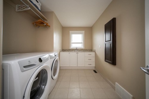 180 Lindstrom Crescent, Fort Mcmurray, AB - Indoor Photo Showing Laundry Room