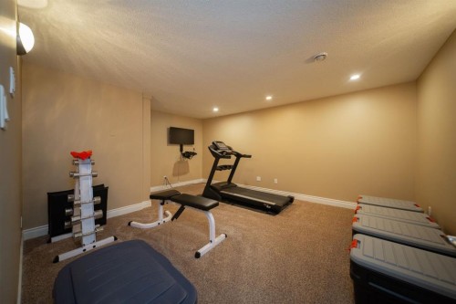 180 Lindstrom Crescent, Fort Mcmurray, AB - Indoor Photo Showing Gym Room