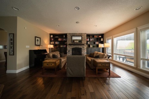 180 Lindstrom Crescent, Fort Mcmurray, AB - Indoor Photo Showing Living Room With Fireplace