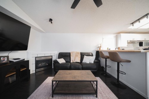 213 Mitchell Drive, Fort Mcmurray, AB - Indoor Photo Showing Living Room With Fireplace