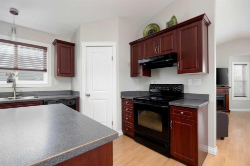 140 Sumac Crescent, Fort Mcmurray, AB - Indoor Photo Showing Kitchen With Double Sink