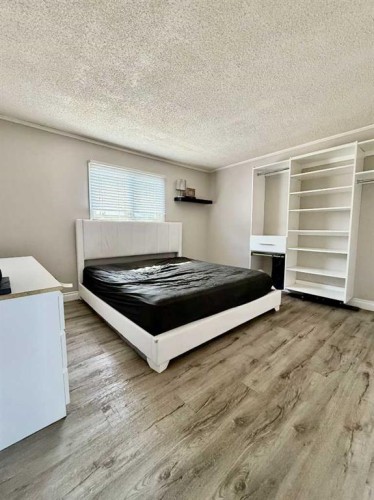 100 Silica Place, Fort Mcmurray, AB - Indoor Photo Showing Bedroom