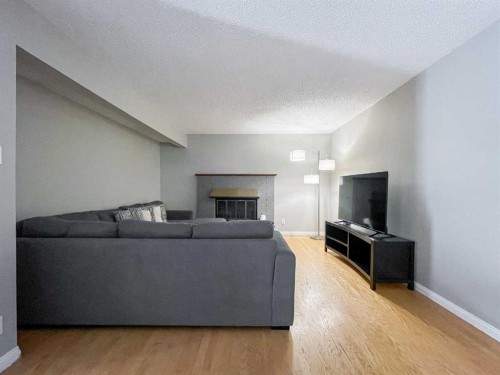 188 Blanchett Road, Fort Mcmurray, AB - Indoor Photo Showing Living Room With Fireplace