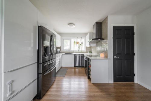 49 Centennial Drive, Fort Mcmurray, AB - Indoor Photo Showing Kitchen With Stainless Steel Kitchen