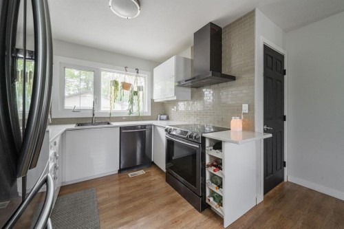 49 Centennial Drive, Fort Mcmurray, AB - Indoor Photo Showing Kitchen With Stainless Steel Kitchen With Upgraded Kitchen