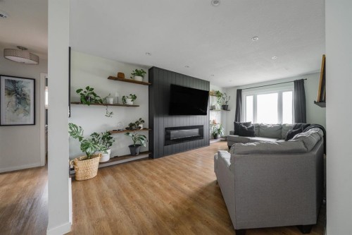 49 Centennial Drive, Fort Mcmurray, AB - Indoor Photo Showing Living Room With Fireplace