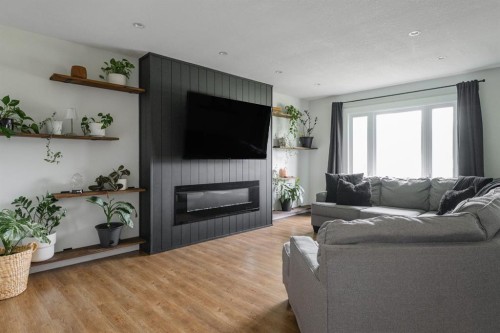 49 Centennial Drive, Fort Mcmurray, AB - Indoor Photo Showing Living Room With Fireplace