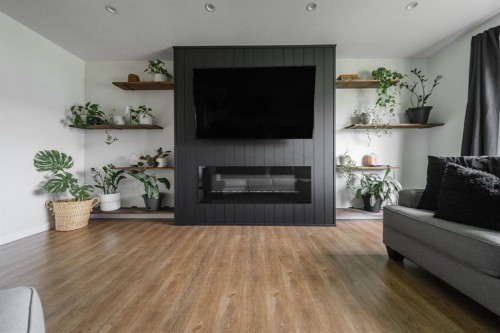 49 Centennial Drive, Fort Mcmurray, AB - Indoor Photo Showing Living Room With Fireplace