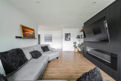 49 Centennial Drive, Fort Mcmurray, AB - Indoor Photo Showing Living Room With Fireplace