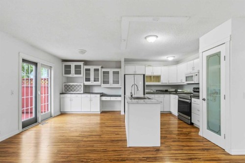 202 Bird Crescent, Fort Mcmurray, AB - Indoor Photo Showing Kitchen With Double Sink