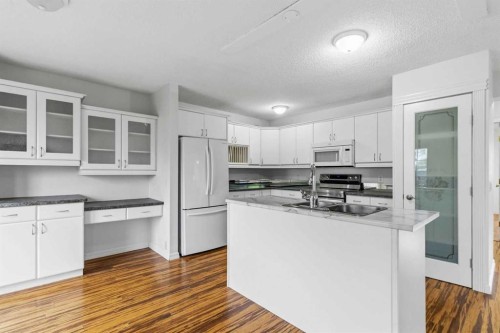 202 Bird Crescent, Fort Mcmurray, AB - Indoor Photo Showing Kitchen With Double Sink
