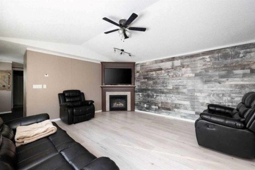 120 Hunter Street, Fort Mcmurray, AB - Indoor Photo Showing Living Room With Fireplace