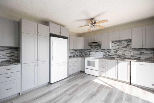 105 Hill Drive, Fort Mcmurray, AB - Indoor Photo Showing Kitchen With Upgraded Kitchen
