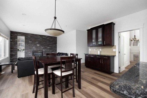 248 Hawthorn Way, Fort Mcmurray, AB - Indoor Photo Showing Dining Room With Fireplace