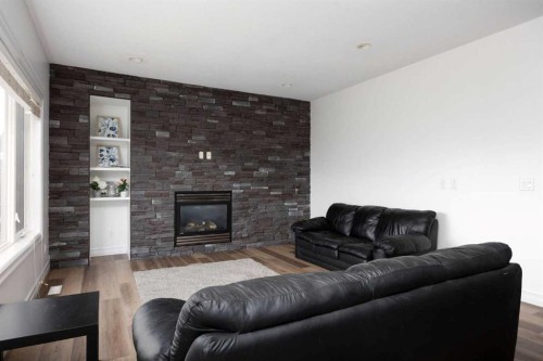 248 Hawthorn Way, Fort Mcmurray, AB - Indoor Photo Showing Living Room With Fireplace