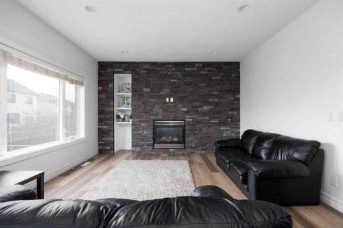 248 Hawthorn Way, Fort Mcmurray, AB - Indoor Photo Showing Living Room With Fireplace