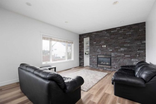 248 Hawthorn Way, Fort Mcmurray, AB - Indoor Photo Showing Living Room With Fireplace