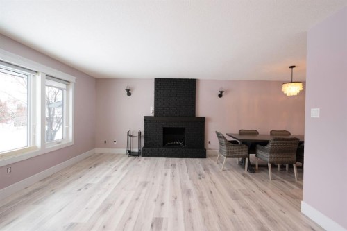 113 Dundas Road, Fort Mcmurray, AB - Indoor Photo Showing Living Room With Fireplace