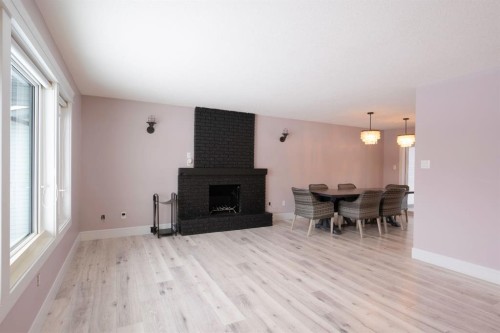 113 Dundas Road, Fort Mcmurray, AB - Indoor Photo Showing Living Room With Fireplace