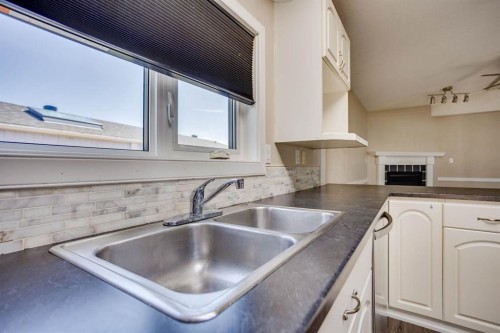 132 Gregoire Crescent, Fort Mcmurray, AB - Indoor Photo Showing Kitchen With Double Sink