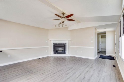 132 Gregoire Crescent, Fort Mcmurray, AB - Indoor Photo Showing Other Room With Fireplace