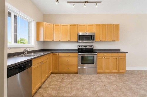 132 Crane Rise, Fort Mcmurray, AB - Indoor Photo Showing Kitchen With Stainless Steel Kitchen With Double Sink