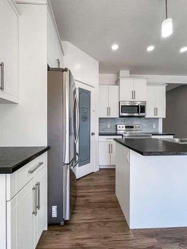 210 Athabasca Avenue, Fort Mcmurray, AB - Indoor Photo Showing Kitchen With Stainless Steel Kitchen With Double Sink With Upgraded Kitchen