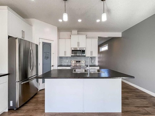 210 Athabasca Avenue, Fort Mcmurray, AB - Indoor Photo Showing Kitchen With Double Sink With Upgraded Kitchen