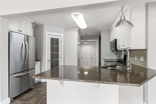 156 J.W. Mann Drive, Fort Mcmurray, AB - Indoor Photo Showing Kitchen With Upgraded Kitchen