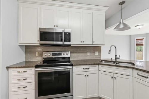 156 J.W. Mann Drive, Fort Mcmurray, AB - Indoor Photo Showing Kitchen With Double Sink With Upgraded Kitchen