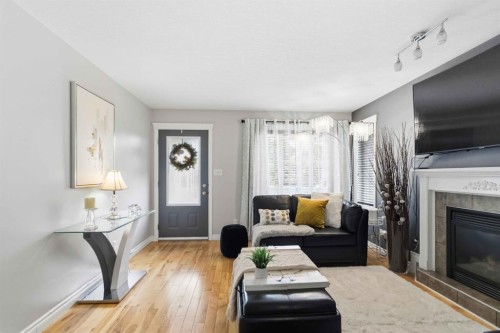 249 Fox Crescent, Fort Mcmurray, AB - Indoor Photo Showing Living Room With Fireplace