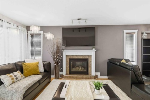 249 Fox Crescent, Fort Mcmurray, AB - Indoor Photo Showing Living Room With Fireplace
