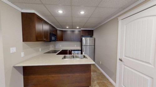 192 Crane Rise, Fort Mcmurray, AB - Indoor Photo Showing Kitchen With Double Sink