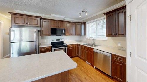 192 Crane Rise, Fort Mcmurray, AB - Indoor Photo Showing Kitchen With Double Sink