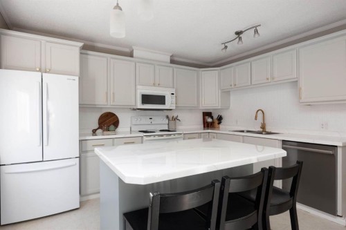 254 Wolverine Drive, Fort Mcmurray, AB - Indoor Photo Showing Kitchen With Double Sink