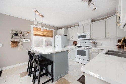 254 Wolverine Drive, Fort Mcmurray, AB - Indoor Photo Showing Kitchen With Double Sink