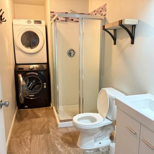 83 Aspen Crescent, Gregoire Lake Estates, AB - Indoor Photo Showing Laundry Room
