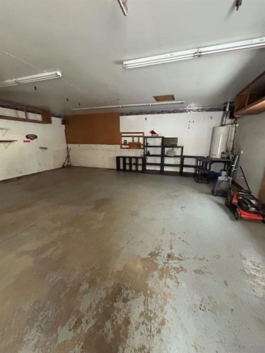 83 Aspen Crescent, Gregoire Lake Estates, AB - Indoor Photo Showing Garage